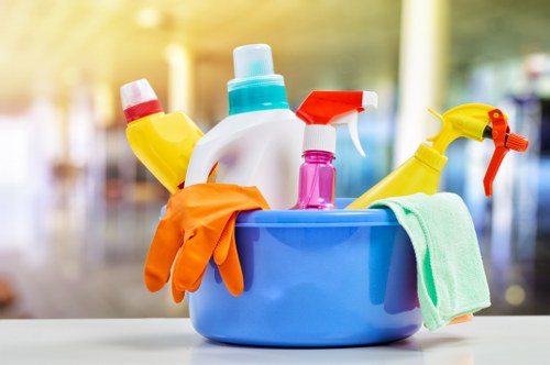 Professional carpets cleaner in SW3 treating a living room carpet